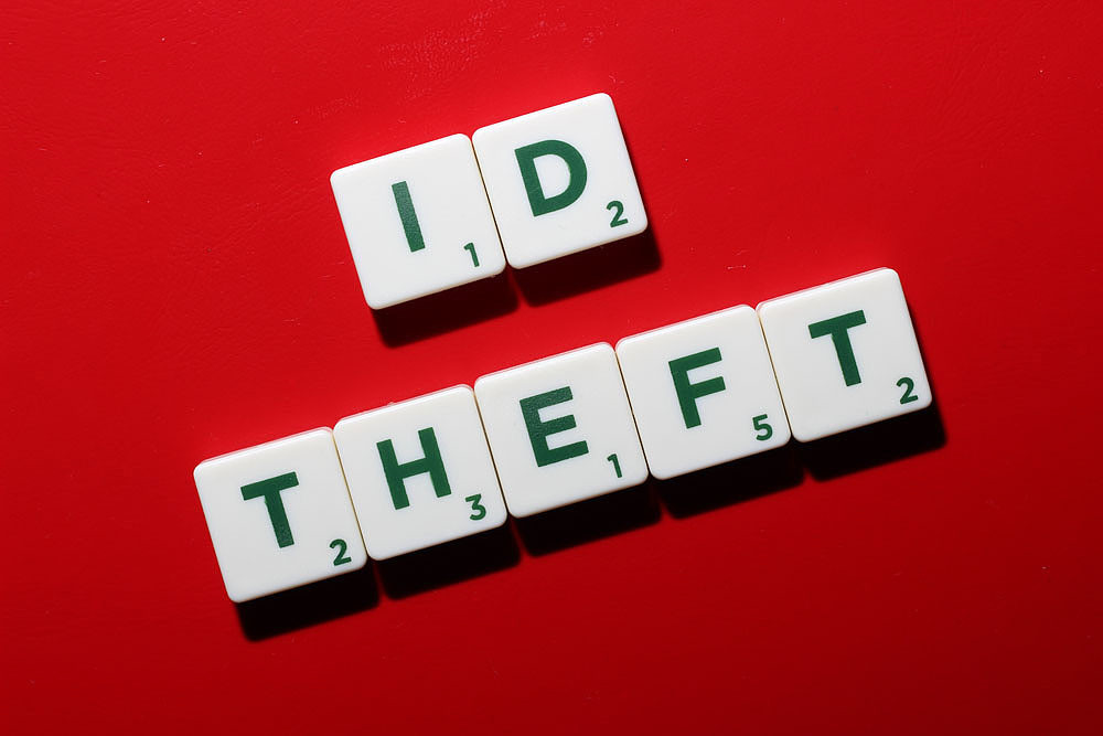 Game tiles spell out ID Theft. CC-BY 2 CafeCredit Flickr.